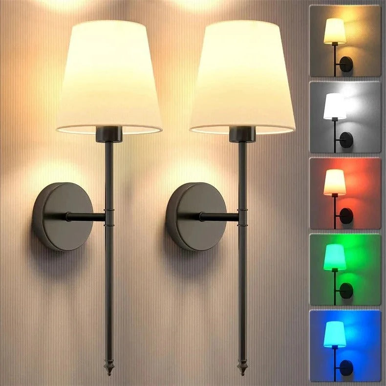 Wall-mounted lamp with multiple color options displayed on a wall.